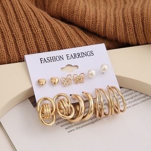 Pearl, butterfly, geometric circle earrings 6 piece set.